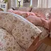 Juego de ropa de cama de cuatro piezas estilo vintage con botones, hecho de algodón puro grueso y lino con estampado floral, juego de tres piezas para estudiante con funda de edredón y sábana bajera.