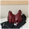 Mochila casual de gran capacidad para mujer 2026 nueva mochila para el trabajo bolsa de hombro cruzada de color liso elegante