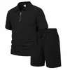 Conjunto de verano de dos piezas para hombre: polo jacquard a cuadros con media cremallera y shorts con cordón elástico