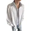 Camisa masculina listrada com retalhos, estilo duas peças falsas, de manga comprida, um design moderno e estiloso para primavera e outono, com corte relaxado e casual.