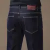Jeans negros de alta gama italianos de cuatro vías para hombre, nuevo estilo casual moderno de corte slim para otoño e invierno