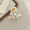 Pinza para el pelo de flor de acetato iridiscente, Pasador amarillo suave y elegante para la parte trasera de la cabeza, Accesorio para el pelo fresco y versátil para mujer