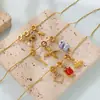 Collar de cadena fina de hueso de serpiente dorada con colgante de lazo desmontable de perlas estilo retro de chica dulce transfronterizo europeo y americano