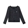 Conjunto de punto de otoño para niñas 2026 estilo nuevo, cárdigan a rayas casual y jeans de pierna ancha conjunto de dos piezas para niños mayores