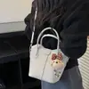 Bolso de mano de nicho estilo coreano transfronterizo para mujer, nuevo bolso tipo cesta de mimbre vintage con patrón de lichi, bolso de hombro y cruzado