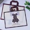 Saco para roupas atacado saco de presente plástico manual sacola de compras loja de roupas saco para roupas sacola tote PE impressa impressão