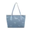 Popular bolsa de mano fresca de este año para mujer, nuevo estilo Otoño 2026, estampado de lazo, bolso de un solo hombro, bolso de axila de moda