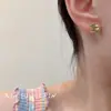 Pendientes Minimalistas de Oro con Moneda de Caballo para Mujer 2026 Nuevo Estilo Pendientes de Alta Gama que Simbolizan Riqueza Instantánea