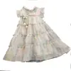 Vestido de Rendimiento Floral para Niñas 2026 Verano Nuevo Estilo con Adornos Plateados y Mangas Acampanadas Vestido de Princesa Ropa Infantil Tendencia al por Mayor