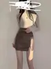 Moderna Minifalda de Imitación de Cuero PU de Cintura Alta para Mujer Otoño Temprano 2025 Nueva Falda de Corte A Dulce Sexy Holgada de Cadera
