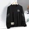 Envío RápidoNuevo Suéter Holgado de Manga Larga Moda Casual Camisa Base Sudadera Estampada de Cuello Redondo de Moda para Hombre para Primavera y Otoño