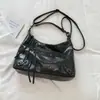 Bolsa de Axila Grande Capacidade Transfronteiriça Feminina 2026 Novo Estilo Tendência Cool Bolsa de Motociclista Casual para o Dia a Dia Ombro Único Transversal Bolsa Tote