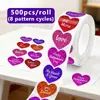 Superventas transfronterizos DIY Día de San Valentín 1 pulgada empaquetado de regalo autoadhesivo láser forma de corazón 500 pegatinas/rollo pegatinas de sellado