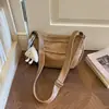 Nova bolsa casual retrô de outono de 2026, grande capacidade para mulheres, bolsa tipo bolinho de cor sólida, bolsa de ombro e transversal simples para o dia a dia