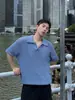 Verano Nuevo Pequeño Cuello en V Azul Camiseta de Punto Lujo Accesible de Moda Marca Moda Urbana Joven Mangas Cortas Ajustada