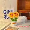 Decoração de Mesa Girassol Enfeites Artesanais Decoração de Escritório Flor Tecida Produto Acabado Presente de Aniversário para Mulheres Novo Estilo