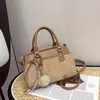 Bolsa de mão casual estilo coreano Shuai Mi Jia para mulheres, nova bolsa transversal da moda e estilosa de 2026 com design único, bolsa feminina de nicho