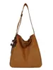 Bolso retro simple de gamuza para mujer, nuevo bolso de hombro cruzado casual para el día a día 2026, bolso hobo de gran capacidad