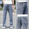 Jeans Masculino Hong Kong 2026 Outono Novo, Corte Reto Solto, High-End, Elástico, Tamanho Grande, Calça Longa Casual de Cor Clara para Primavera