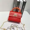 Bolsa de Gelatina 2023 Nueva Bolas de Colores Patrón de Cocodrilo Bolso de Mano Cadena Hombro Cruzado Bolso de Exportación Bolsa Pequeña para Niños