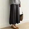 Falda midi de punto minimalista estilo coreano para mujer, nueva colección otoño/invierno 2026, de cintura alta, adelgazante, corte holgado, falda línea A suave y cómoda con dobladillo acampanado