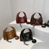 Bolso de hombro sencillo y moderno para mujer, otoño e invierno 2024, nuevo estilo coreano, bolso cruzado informal, bolso de mano con estilo distintivo.