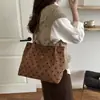 Bolsa tote fresca da moda deste ano para mulheres, nova bolsa de ombro chique de bolinhas outono 2026, bolsa de axila para o dia a dia