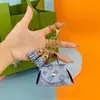 Bolsa Pequena Vintage de Couro Criativa para Venda por Atacado Chave Mini Armazenamento Fone de Ouvido Fivela Borla Porta-Moedas Armazenamento Criativo
