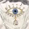 Broche de Ojo del Diablo Estilo Coreano de Lujo Transfronterizo Diamante Azul Diseño de Nicho Broche de Ojo Exquisito Pin de Pedrería