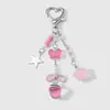 Estilo Primavera Fofo e Doce Exquisito Contas Galáxia Morango Laço Urso Nota Musical Pom-Pom Chaveiro Pingente de Bolsa