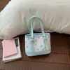 Bolso Cubo con Estampado de Dibujos Animados para Mujer Primavera/Verano 2026 Estilo Coreano Moda Bolso de Hombro de Gama Alta Bolso Casual de Moda para Mujer