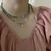 Collar con colgante de pétalo de nicho centrado en el diseño con cuentas para mujer 2026 nuevo estilo cadena de clavícula de lujo ligero