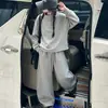 Conjunto de sudadera de otoño e invierno para niñas 2026 nuevo casual estilo coreano deportivo sudadera y pantalones de chándal para niños mayores