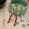 Nuevo Estilo Chino Cool Perla Antiguo Triángulo Clip para la Oreja Sin Agujeros en la Oreja Pendientes Colgantes Nicho de Lujo Ligero Retro para Mujer