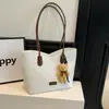 Bolso tote de diseño nicho, nuevo modelo verano 2026, alta calidad, moderno, versátil, casual, bolso de hombro vintage