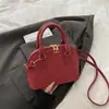Bolsa de Mão da Moda Tendência de Nicho para Mulheres 2026 Novo Modelo Texturizada Versátil Bolsa Concha Estilosa para o Dia a Dia Bolsa Transversal