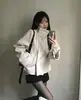 Chique coreano, novo estilo de inverno, gola alta, acolchoado, grosso, abotoado, casaco de lã quente para mulheres, top casual solto