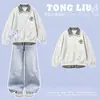 Conjunto de dos piezas para niñas de primavera y otoño: Top de manga larga con cuello de cuadros combinado con jeans casuales versátiles con estampado de estrellas
