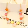 Joyería de moda europea y americana color caramelo bohemio fresco colorido gema ojo de gato collar corto