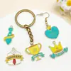 Mezcla 10 Corazón Azul Dorado Goteo de Aceite Corbata Trofeo Corona Colgante de Aleación Accesorios de Joyería DIY para el Día del Padre