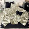 Venta al por mayor de ropa de cama de algodón bohemio de cuatro piezas, estilo japonés, pequeña, fresca, nórdica, sencilla, para familias.