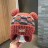 Bonitos y adorables gorros de otoño e invierno para niños, con diseño de poner, material de punto y una serie de dibujos animados, que brindan abrigo y protección para los oídos para bebés y niños pequeños.
