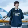 Camiseta elegante de manga corta para hombre, nuevo estilo de verano, estilo de Hong Kong, marca de moda con letras, versátil americana de media manga, top holgado de moda