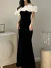 Vestido de Terciopelo Dorado de un Solo Hombro para Mujer en Otoño e Invierno Francés Delgado Ajustado Vestido Cola de Pez Falda Larga Anfitrión de Reunión Anual