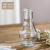 Jarrón Pequeño de Vidrio Vintage Personalizado Estilo Europeo en Relieve Calibre Pequeño Mini Jarrón Flores Secas Flor Arreglo Floral Transparente
