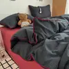 Luxo leve, simples e macio, conjunto de cama de quatro peças com cordão estilo Muji para dormitório estudantil - um retorno à simplicidade