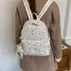 Nueva mochila de moda de otoño para mujer con correa para el hombro y colgante, mochila versátil de estrella coreana 2026 con un toque de nicho
