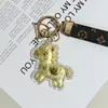 2026 Ano do Cavalo Corrente de Celular Lanyard de Ouro Puro 999 Atrai-Dinheiro Chaveiro de Carro Dourado Pingente de Bolsa Presente para Namorada