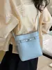 Bolsa Feminina Retro com Padrão Lichia Transfronteiriça 2026 Nova Versátil Texturizada Moda Commuter Ombro Transversal Celular Bolsa Balde