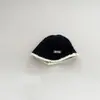 Gorro de punto estilo occidental otoño e invierno Nuevo estilo coreano simple versátil para niños medianos y grandes sombrero de lana estilo occidental gorro de pescador venta al por mayor